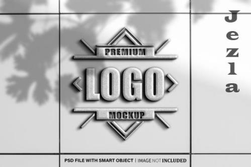 Silver 3d Logo on White Wall Mockup Psd