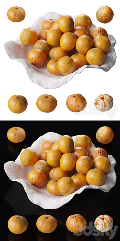 Tangerines in a clay bowl
